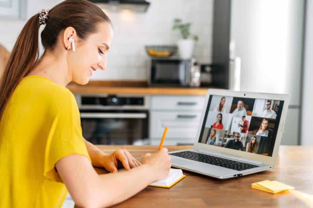 A woman participating in a webinar.